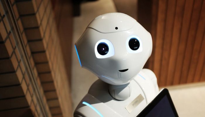 A robot looking at the camera. — Pexels