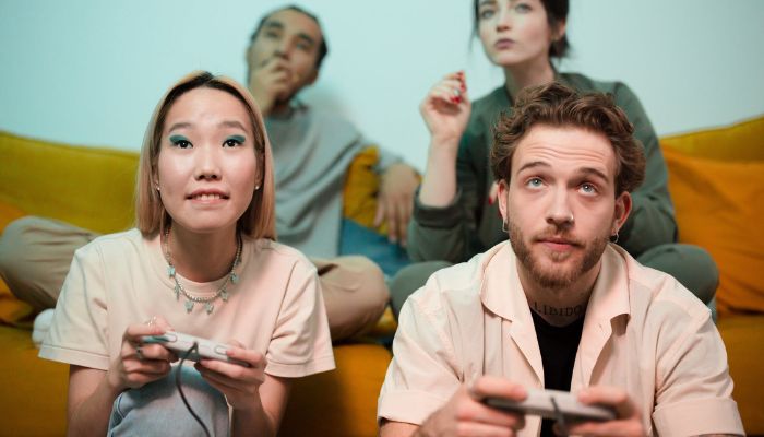 Man and woman playing game. — Pexels