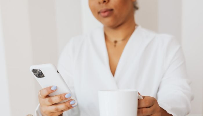 A person using iPhone. — Pexels