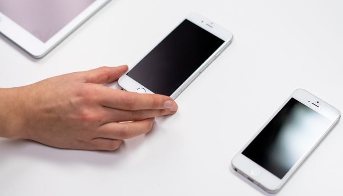 A representative picture of Android and iPhone. — Canva/File
