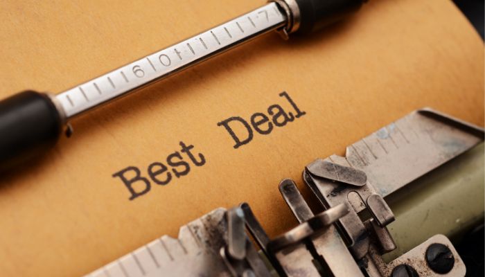 An undated picture illustrating a typewriter with Best Deal typed on a paper. — Canva