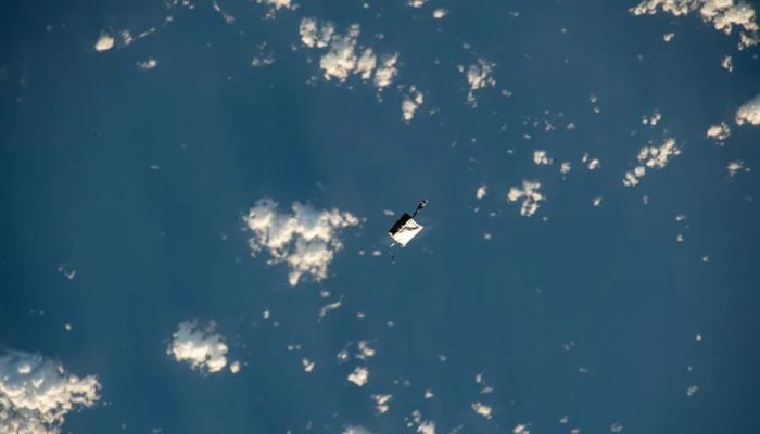 An astronaut toolbag dropped during a spacewalk can be seen orbiting Earth on Nov. 2, 2023. — NASA