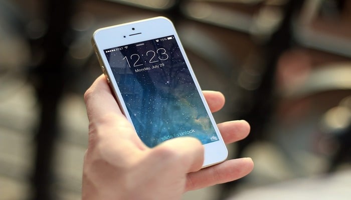 A representational image shows an iPhone held in hand. — Pixabay