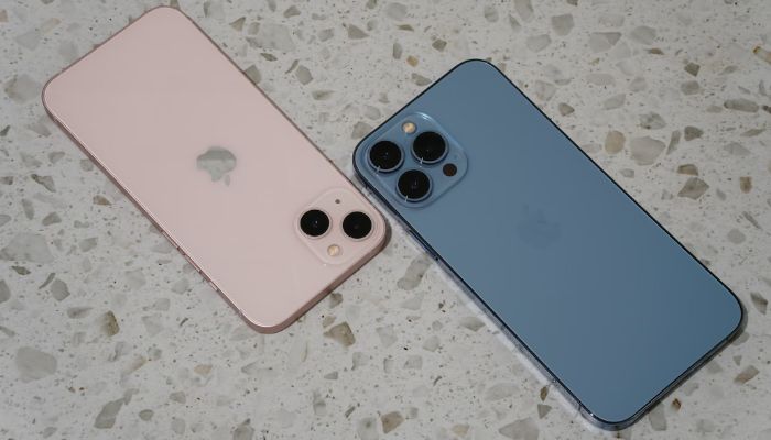 An undated image displays the iPhone 13 and iPhone 15. — Unsplash