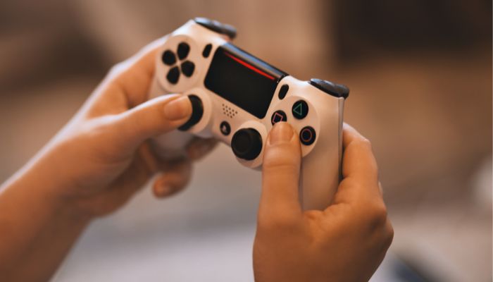 An undated image illustrating a person playing a game. — Canva