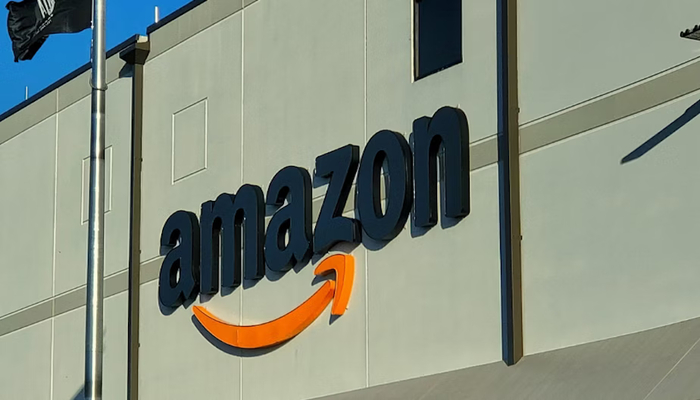 An undated image shows Amazon logo displayed on a building. — Unsplash