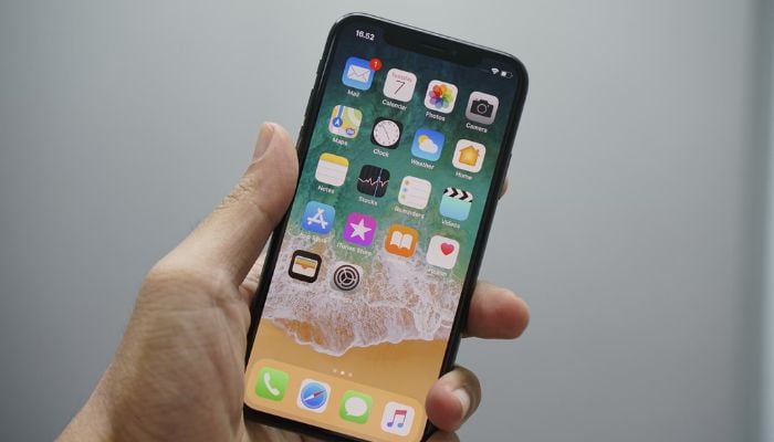 The image shows an iPhone. — Unsplash