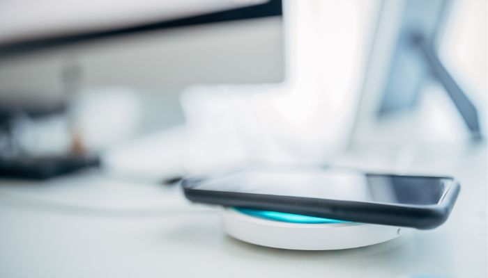 An undated image illustrating wireless charging. — Canva