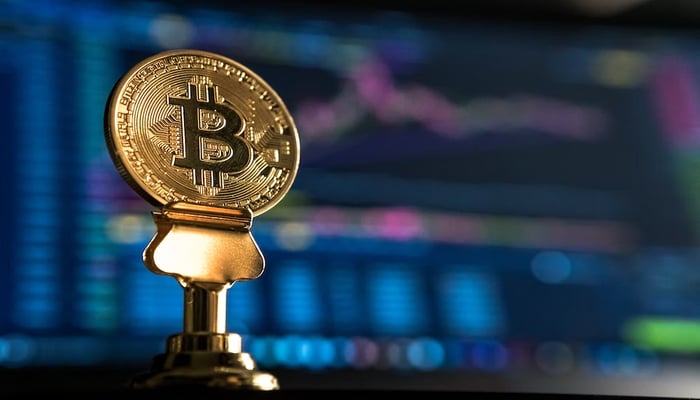 The image shows a Bitcoin. — Unsplash