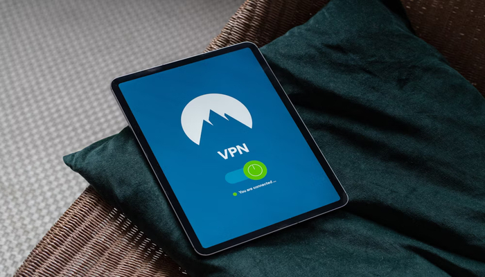 A representational image shows a VPN open on a tablet. — Unsplash