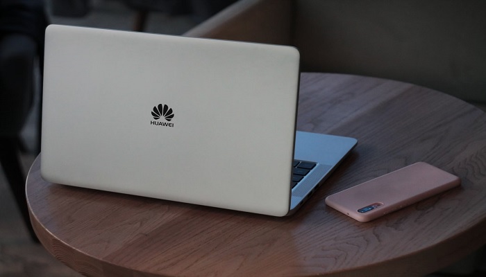 The image shows a Huawei laptop. — Unsplash