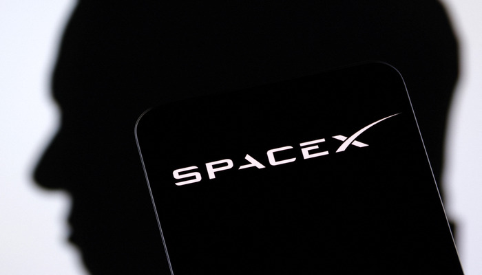 SpaceX logo and Elon Musk silhouette are seen in this illustration taken, December 19, 2022. — Reuters