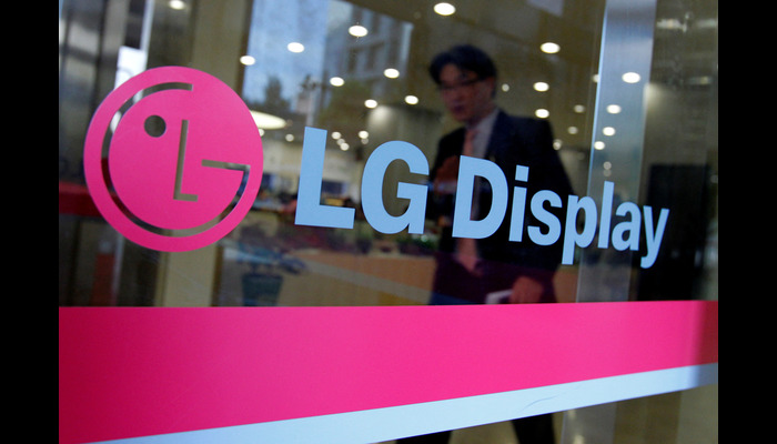 A man walks out of the headquarters of LG Display in Seoul, October 20, 2011. — Reuters