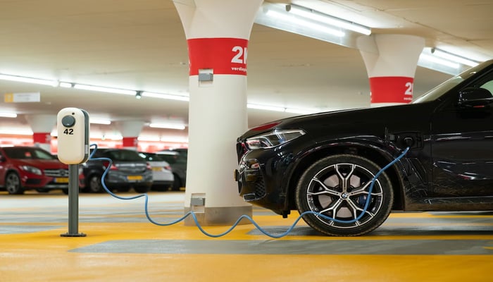 The image shows an electric vehicle. — Unsplash