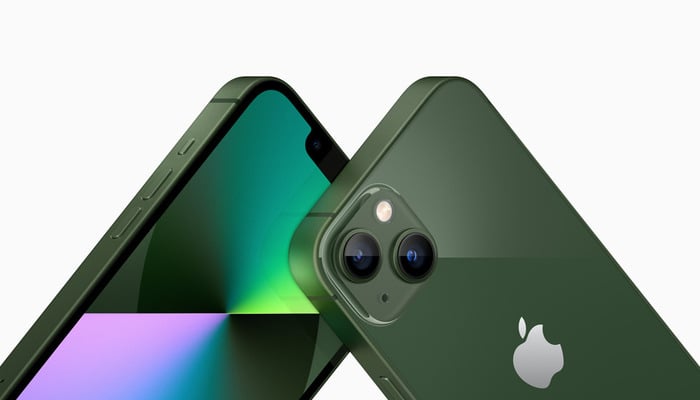 The image shows an iPhone 13. — Apple