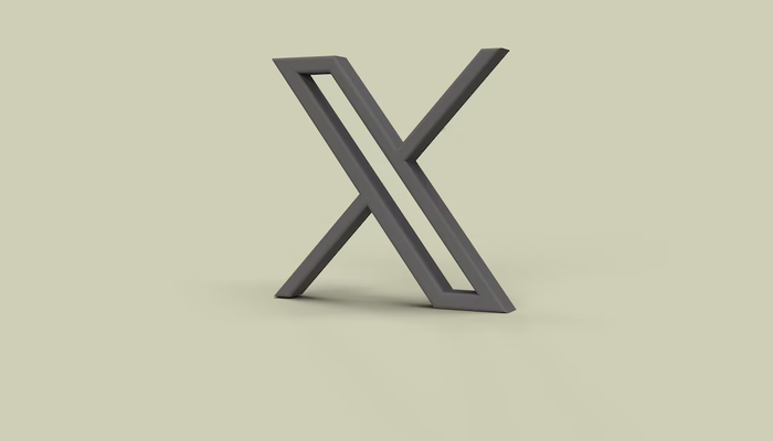 An undated image displaying X logo. — Unsplash