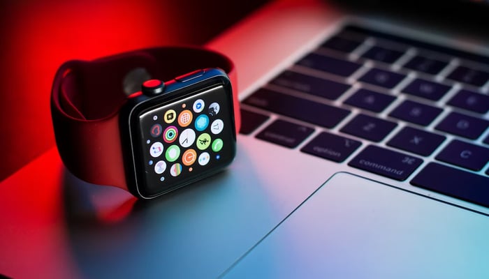 An undated image of an Apple watch placed on a laptop. — Unsplash