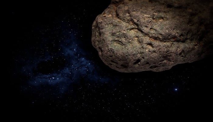 The image is an illustration of an asteroid. — Pixabay