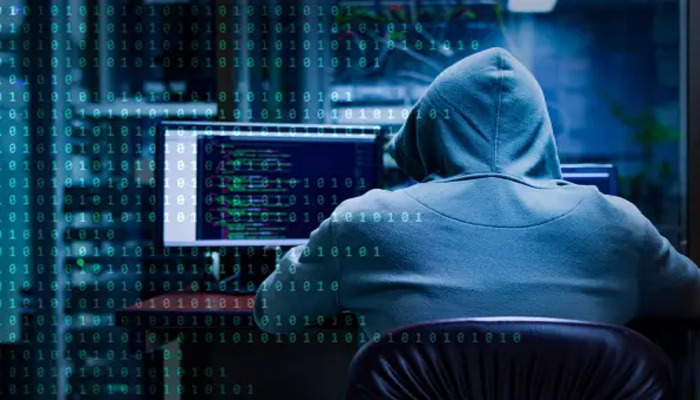 An undated image displaying a hacker. — Unsplash