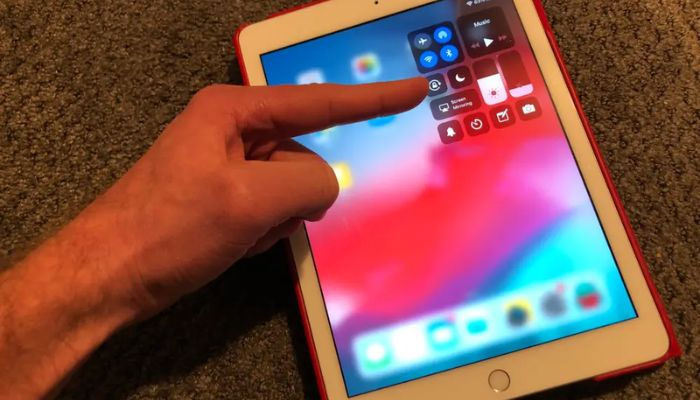A person turning the rotation button on. — Businessinsider/File