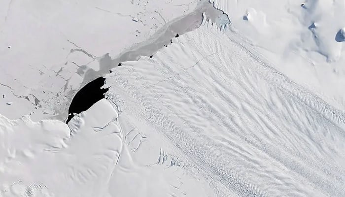 A 2017 photo shows a new iceberg calved from Pine Island Glacier, one of the main outlets where ice from the West Antarctic Ice Sheet flows into the ocean. — NASA Earth Observatory