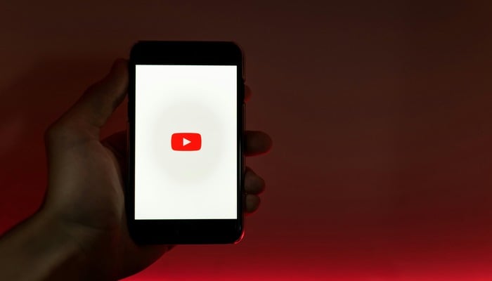 An undated image displaying YouTube logo. — Unsplash