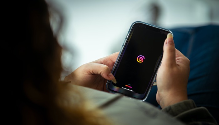 An undated image displaying Threads on a mobile screen. — Pexels