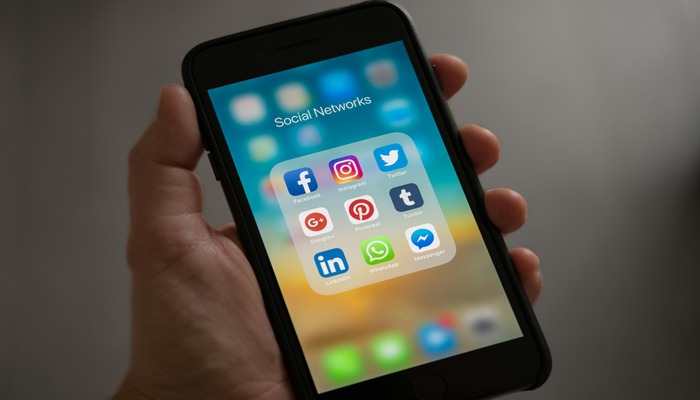 An undated image displays social media apps icons on a mobile screen. — Pexels