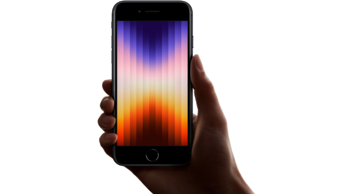 An undated image of the Apple iPhone SE on hand. — Apple