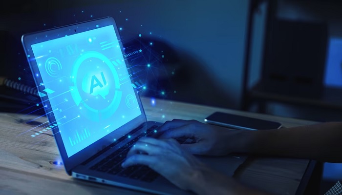 The image is a stock photo of a person using a laptop. — Freepik