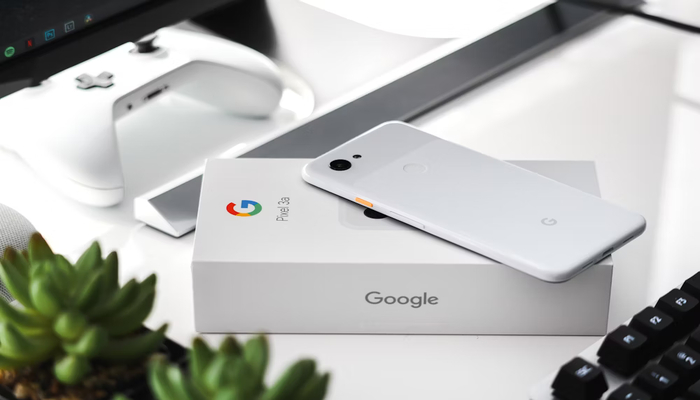 An undated image shows a Pixel phone placed atop its box. — Unsplash