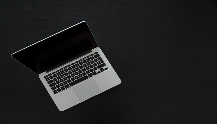The image shows a Macbook. — Pexels