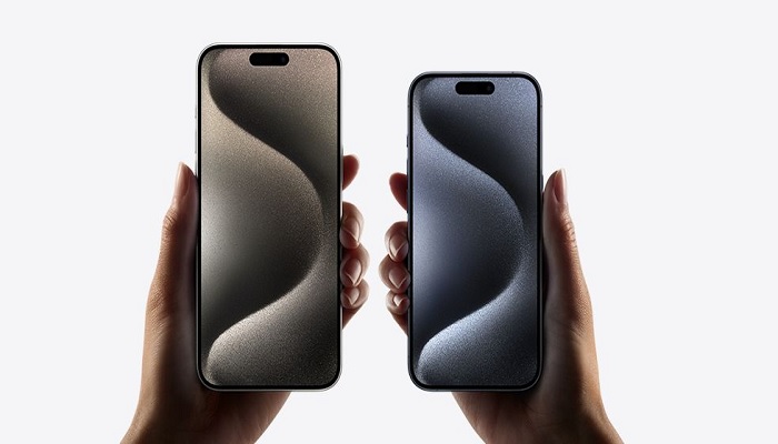 The image shows the iPhone 15 Pro and iPhone 15 Pro Max. — Apple