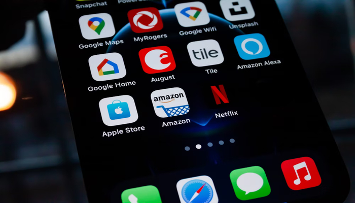 An undated image displaying iPhones home screen. — Unsplash