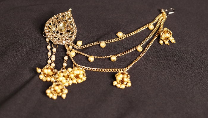 An undated image of gold jewellery displayed on a black cloth. — Pixabay