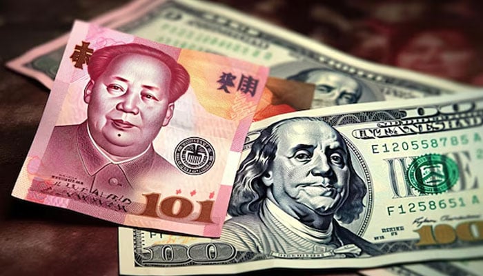 An undated image of Chinese Yuan and US dollar currency. — Freepik