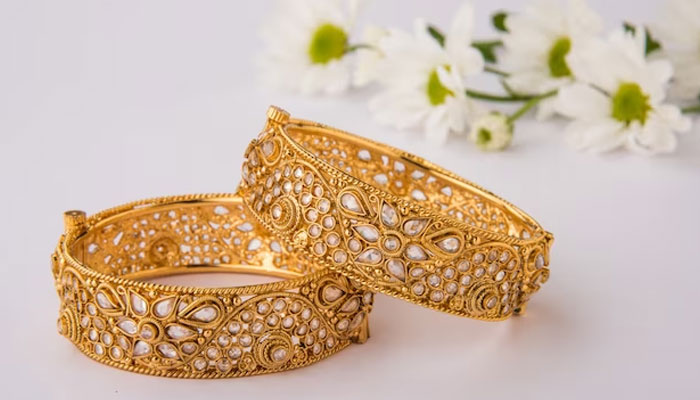 An undated image of gold bangles. — Freepik