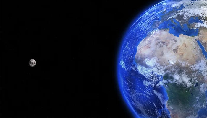 An undated image of moon and earth — Rawpixel