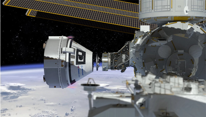 A concept of Boeing Company’s crew spacecraft docking to the International Space Station (ISS) — NASA/File