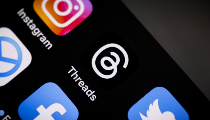 An undated image displaying Threads logo. — Unsplash