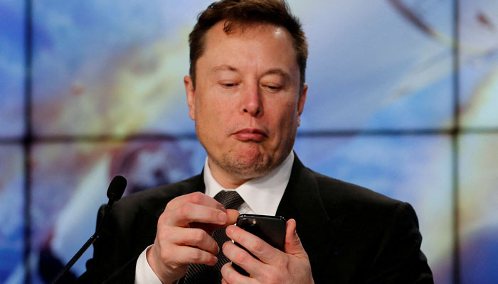 Elon Musk looks at his mobile phone in Cape Canaveral, Florida, US January 19, 2020. — Reuters