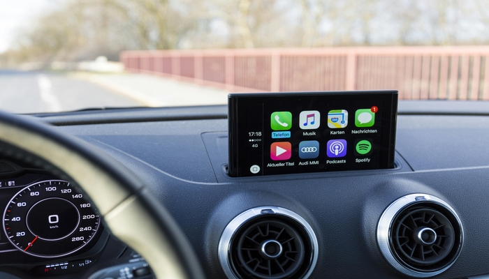 An undated image shows Apple CarPlay open on a cars dashboard. — Pexels