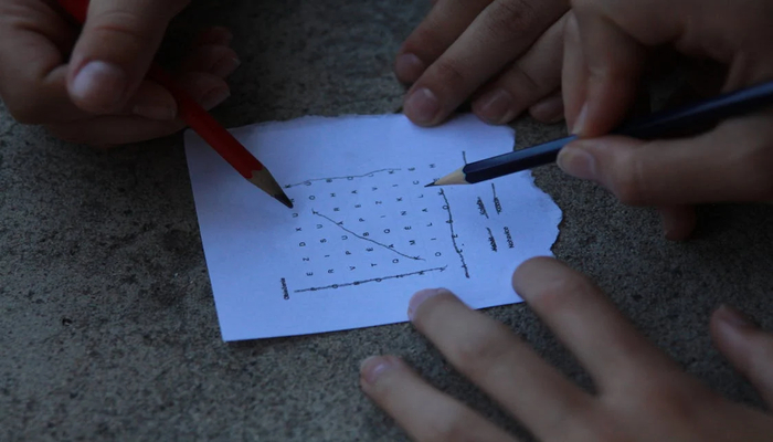 An undated image showing kids playing solving a puzzle. — Pexels