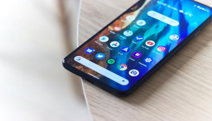 An undated image of an Android phone on the table. — Unsplash