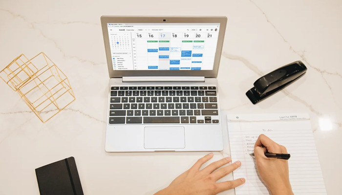 An undated image of a person using Google Calendar. — Google blog