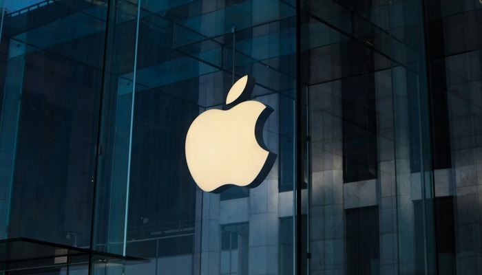 An undated image of an Apple logo displayed on a building. — Apple