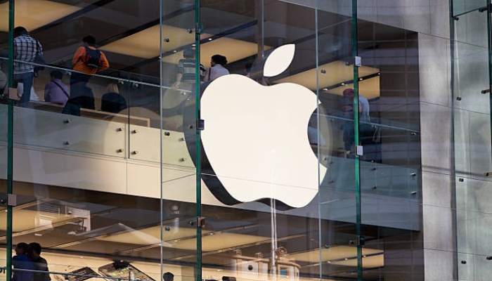 An undated image of Apple logo displayed on a building. — Unsplash