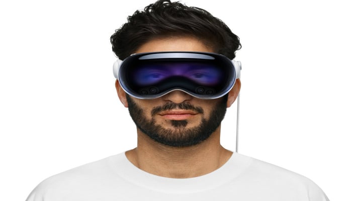 An undated image of a person wearing an Apple Vision Pro. — Apple