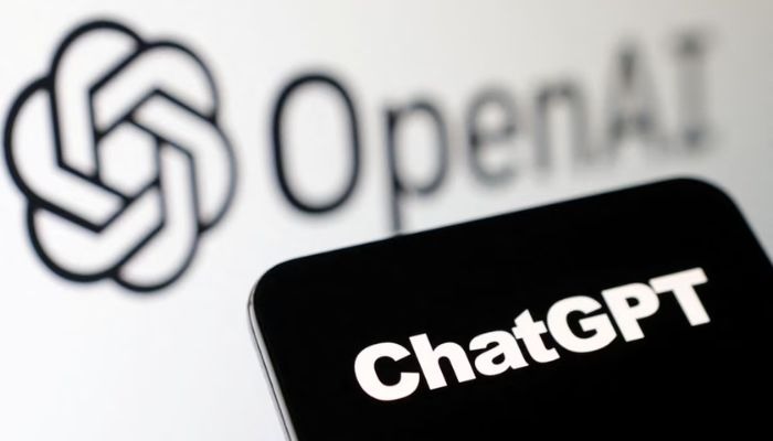 The image shows ChatGPT typed on a phone screen with the OpenAI logo in the background. — Pexels