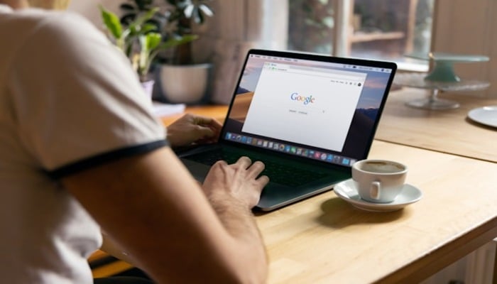 An undated image of a person using a laptop. — Unsplash
